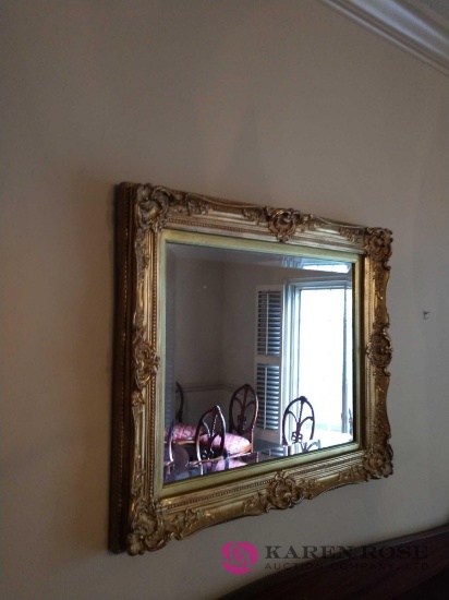 32 in by 27 inch framed mirror