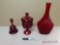 3 pieces of ruby red glassware