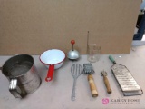 Group of assorted vintage kitchen utensils