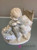 Dolfi Figurine 151 boy sitting on bed