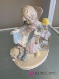 Dolfi 151 figurine girl sitting in chair