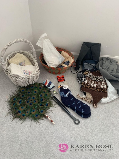 winter hats, socks, basket with hand towels