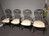 Four metal cushioned chairs
