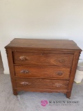 Wooden bedroom dresser with wooden knobs