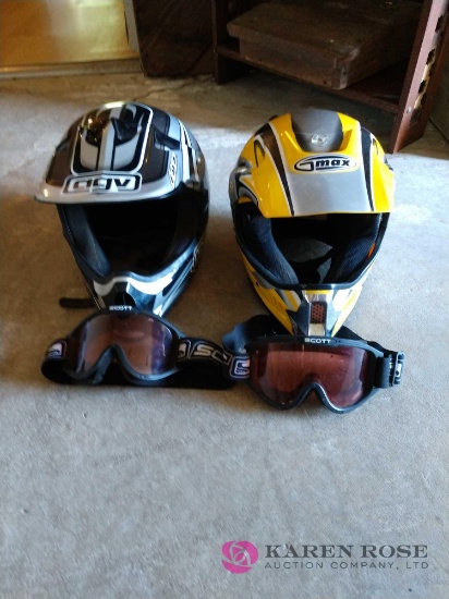 2 dirt bike helmets with goggles