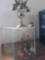 Brass figurines and glass case