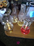 4 oil lamps