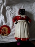 Vintage Aunt Jemima cast iron bank and large button