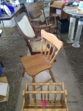 2 rocking chairs wooden chair and magazine rack