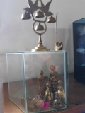 Brass figurines and glass case