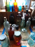 Collection of colorful jars and miscellaneous