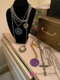 Six costume jewelry necklaces