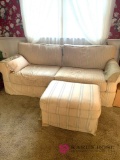 Sofa with footstool