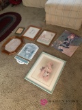 Lots of assorted decorative pictures and frames