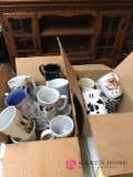 Two boxes of cow coffee mugs