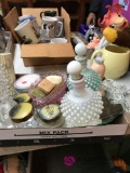 lot of perfume bottles and mirror
