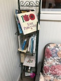 Metal book rack with books