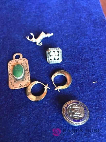 Lot of sterling silver pieces ear rings,pendant and pins