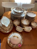 D-1 50 piece 22 carat gold painted China set