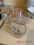 K Liquid measuring cups one Pyrex and one fire king