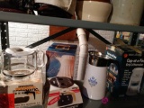 Lot including coffee carafes, Christmas dishes, popcorn maker, and more see pictures