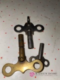 Three vintage clock keys