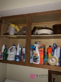 Cleaning supplies above washer and dryer