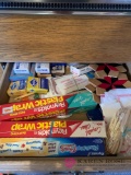Kitchen drawer of sandwich pics toothpicks and miscellaneous