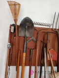 lot of yard tools on wall