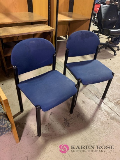 Two matching blue chairs