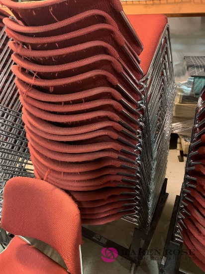 23 red stackable chairs with rolling cart