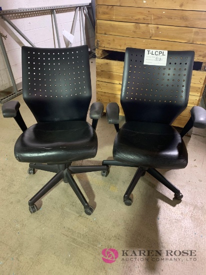 Two matching black computer chairs