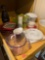 Contents of the kitchen shelf vegetable chopper?s measuring cups and