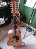 B2 Martin & company acoustic guitar with dual guitar stand