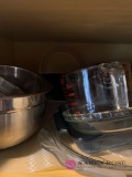 Contents of kitchen shelf mixing bowls baking dishes Pyrex mixing glass