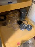 Contents of kitchen shelf magic bullet