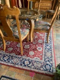 Area rug under kitchen table