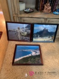 Three framed photographs