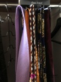 Rotating tie rack with designer ties