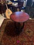 Small round side table in office