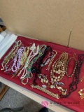 19 Costume jewelry necklaces and earrings
