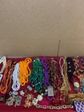 20 costume jewelry necklaces plus earrings and bracelets