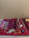 Costume jewelry including 13 necklaces