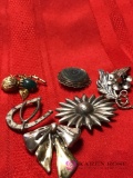 Assorted sterling silver brooches