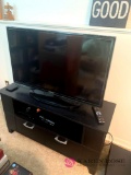 down stairs, Samsung 40 inch TV TV stand plus DVD player