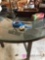 Glass round table with 5-chairs one chair needs repaired