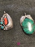 2- sterling Native American pendants