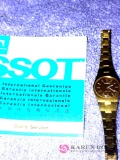 Tissot Stylist gold colored watch