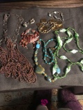 3-necklaces 2- bracelets-2- pendants- ring