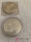 Two silver eagle tokens
